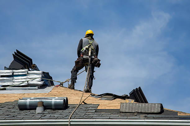 Professional Roof Replacement technician working in Greenville, RI